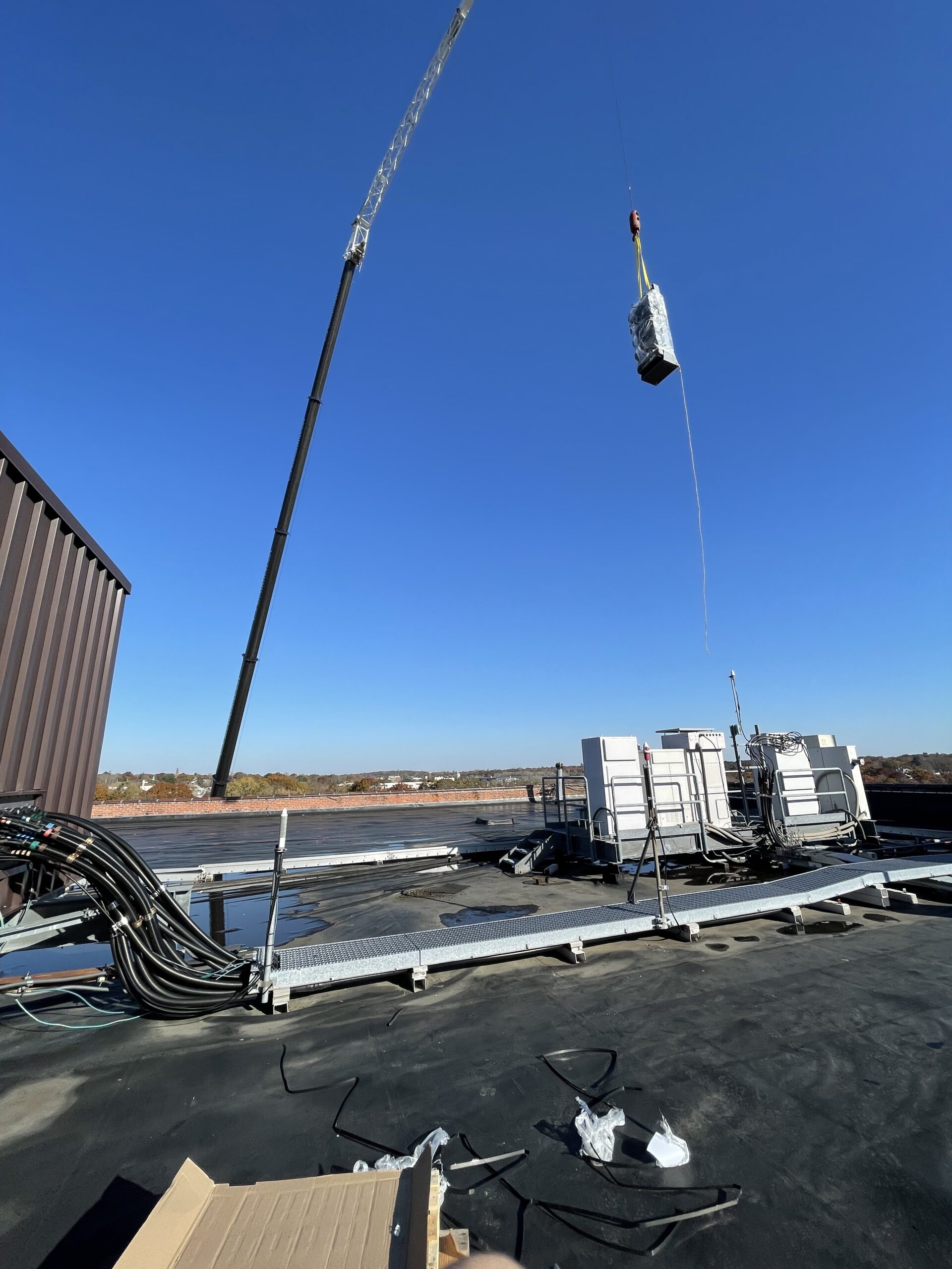 Crane lifting wrapped load